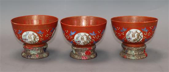 A set of three Chinese coral ground bowls, Republic period